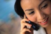 Young woman talking on the phone